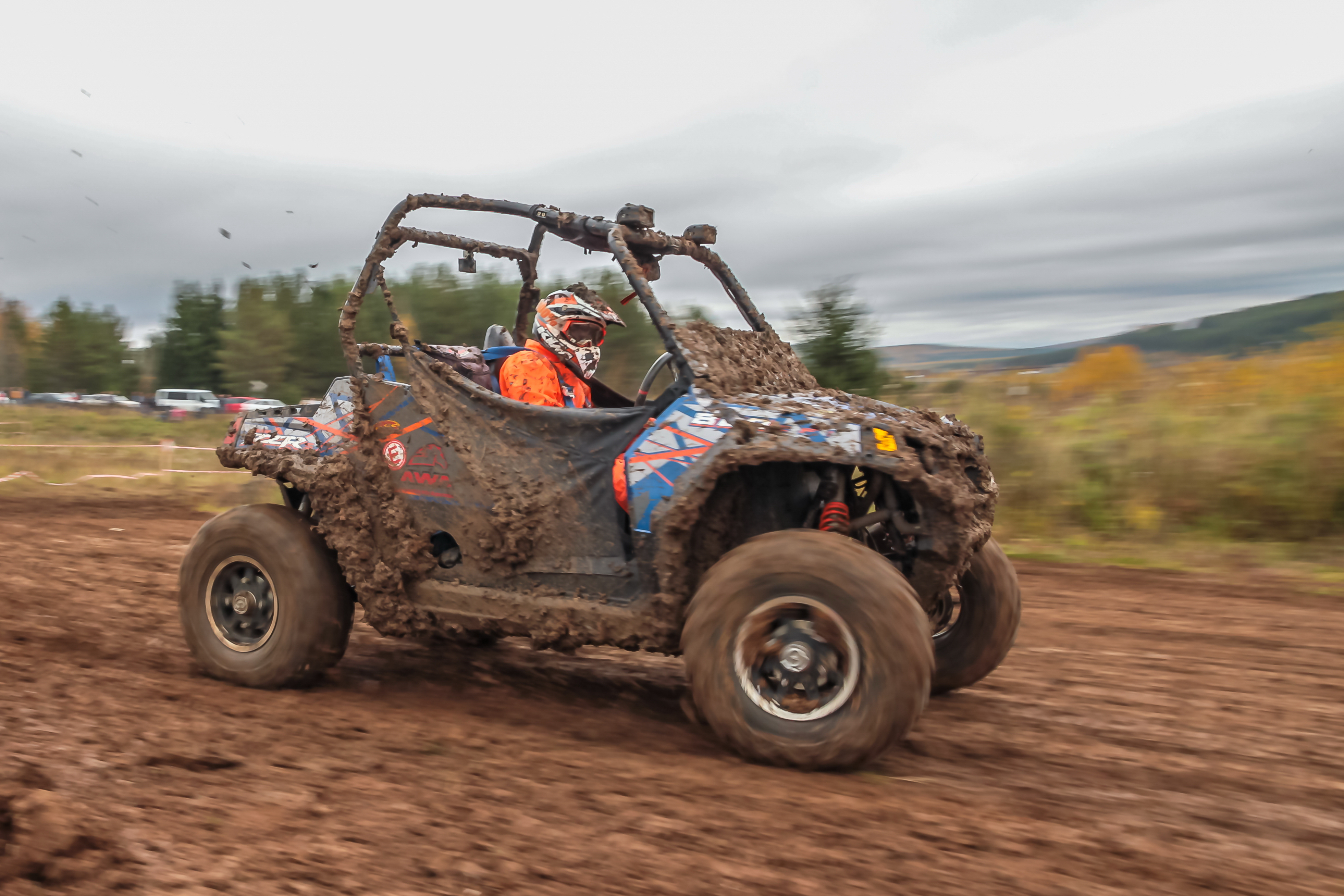 all terrain vehicle driving in mud